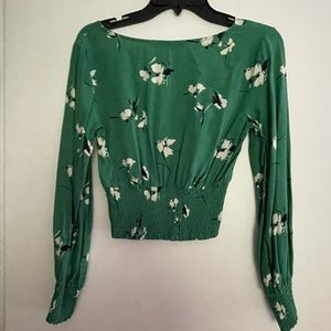 Gently used A&F shirt, green with white flowers.